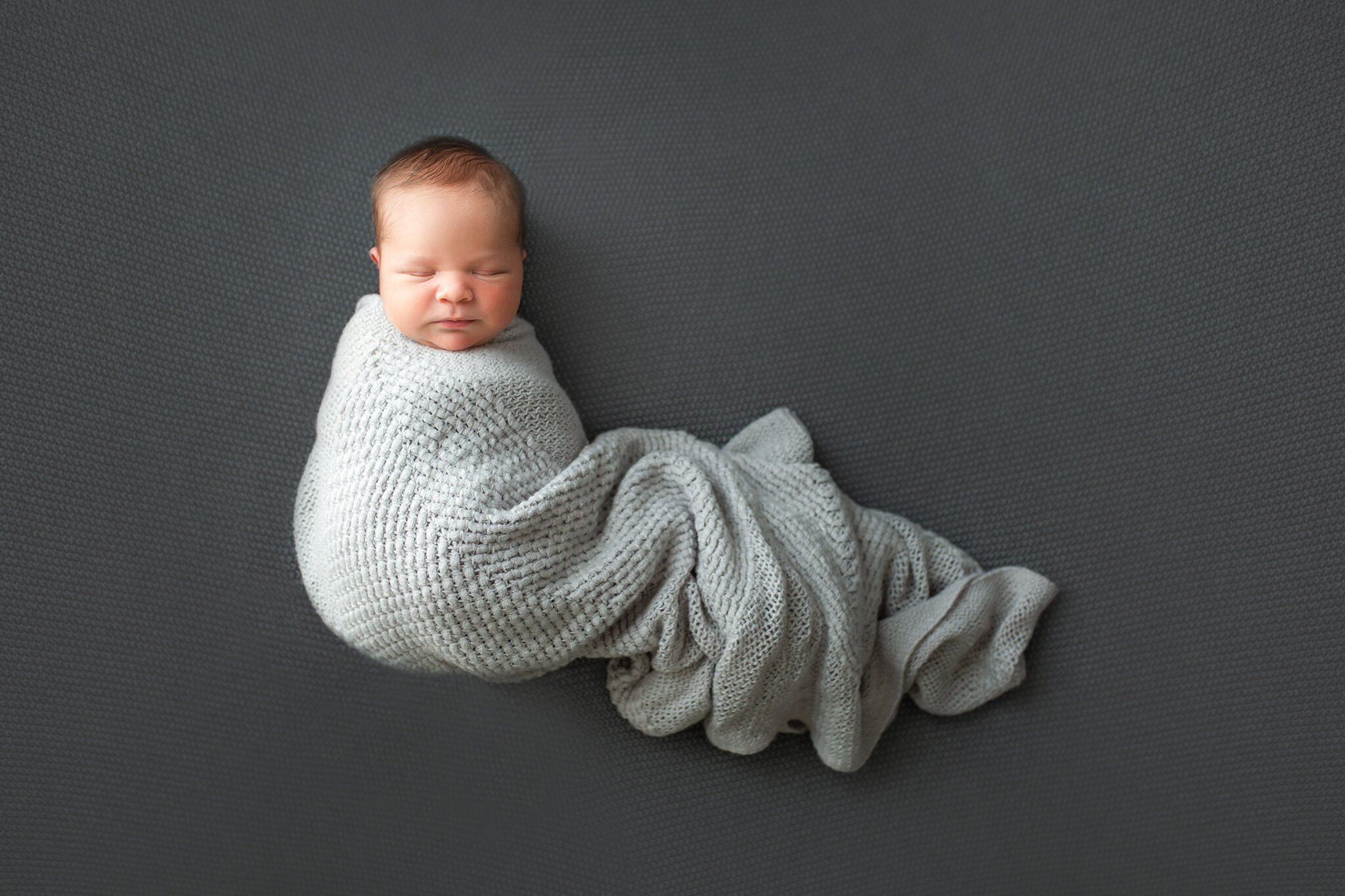 baby snuggle in blanket Asheville Newborn Photographer.jpg