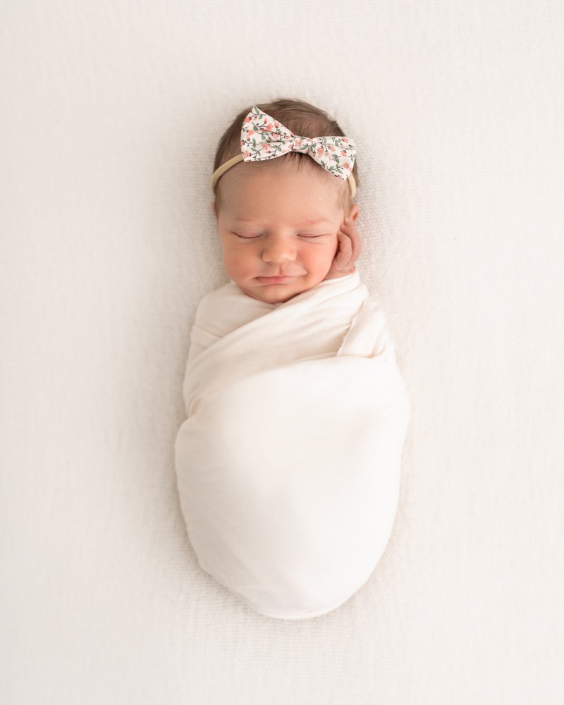 Newborn baby girl with headband Asheville family photographer
