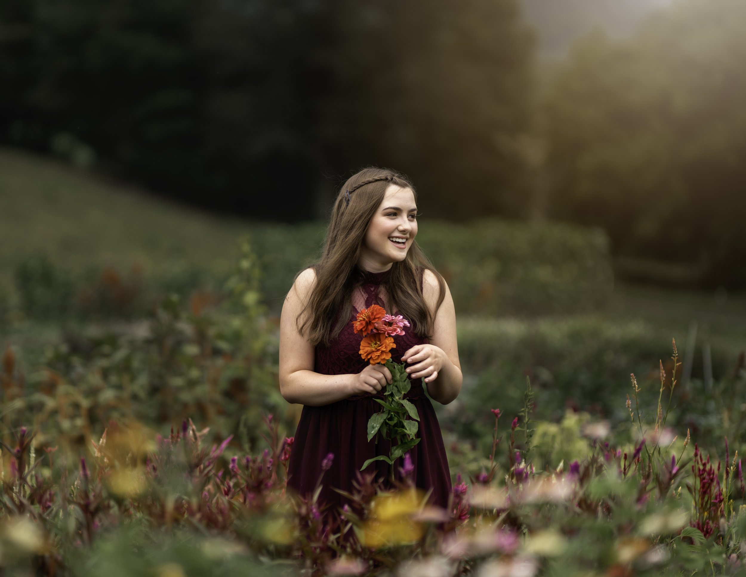 senior girl in flower fields Asheville's Best Senior Photographer