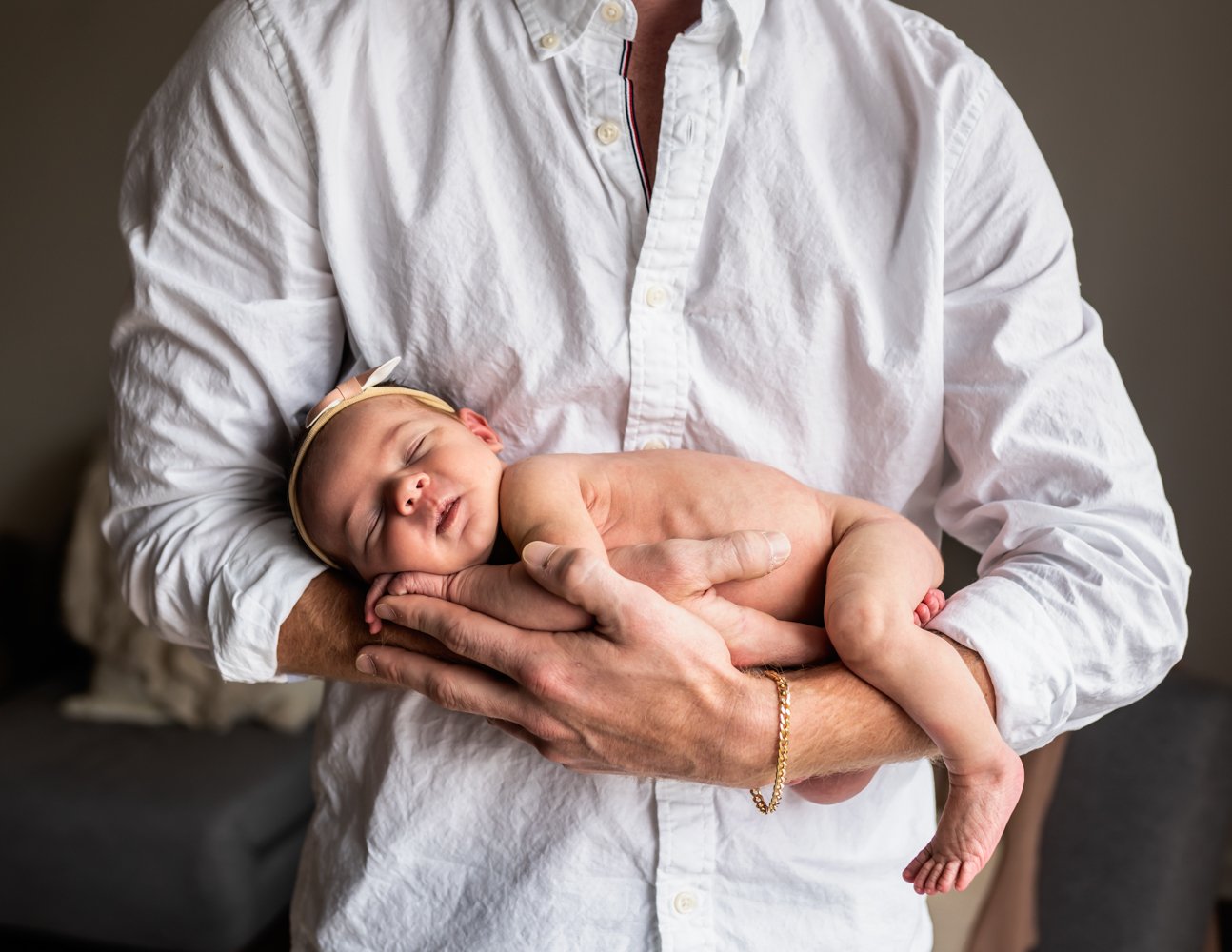 newborn baby girl with her dad Asheville newborn photographer