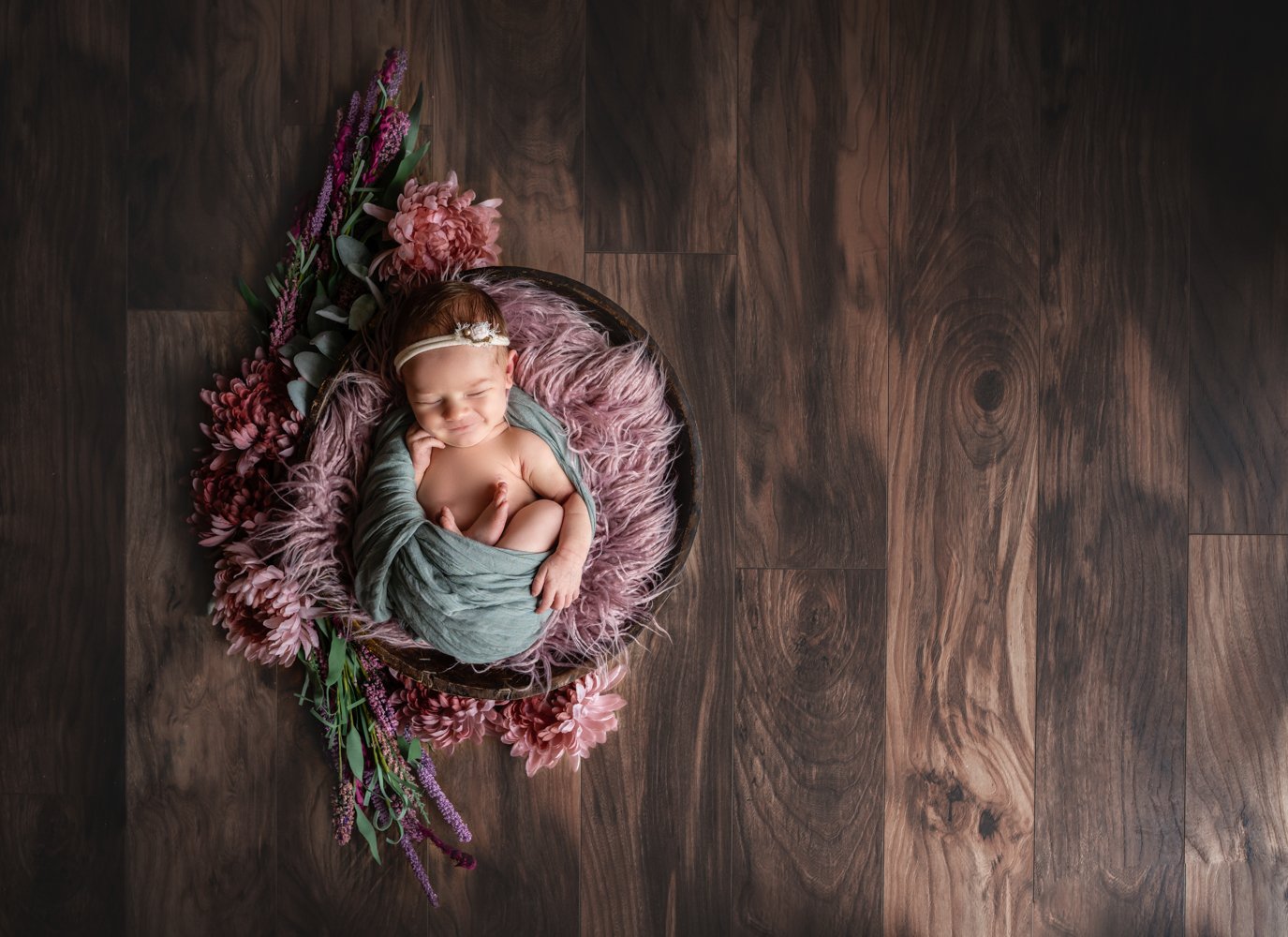 newborn baby girl with flowers Asheville newborn photographer