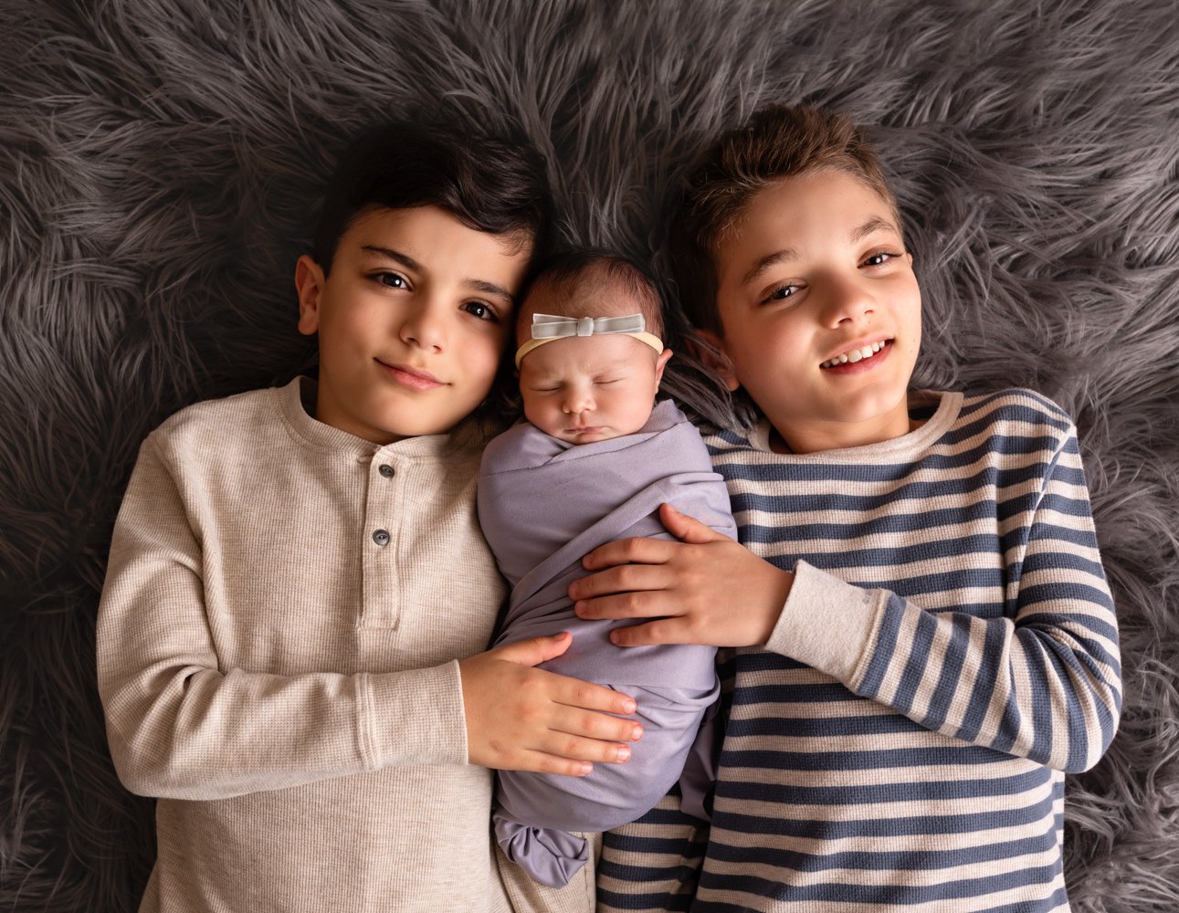 Big brothers with their baby sister - Asheville Newborn Photographer